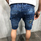 Ripped denim shorts